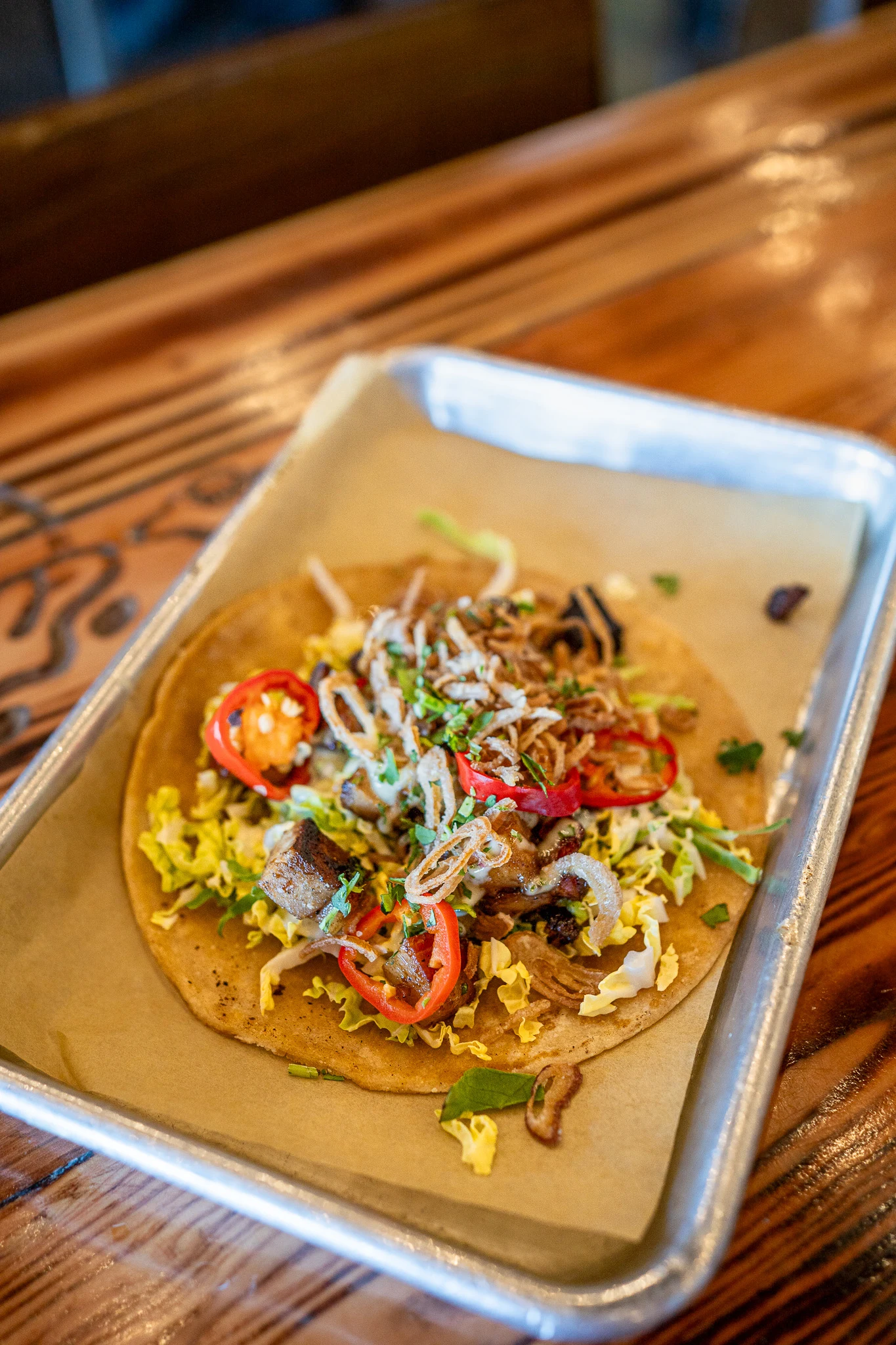 Vietnamese style pork belly tacos from Arts District Kitchen