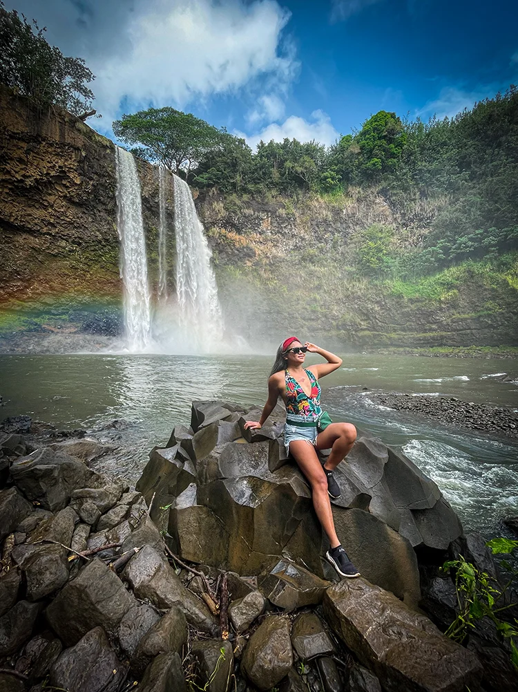 Wailua Falls Hike to base schimiggy wearing dippin daisys lululemon and lovers and friends denim shorts