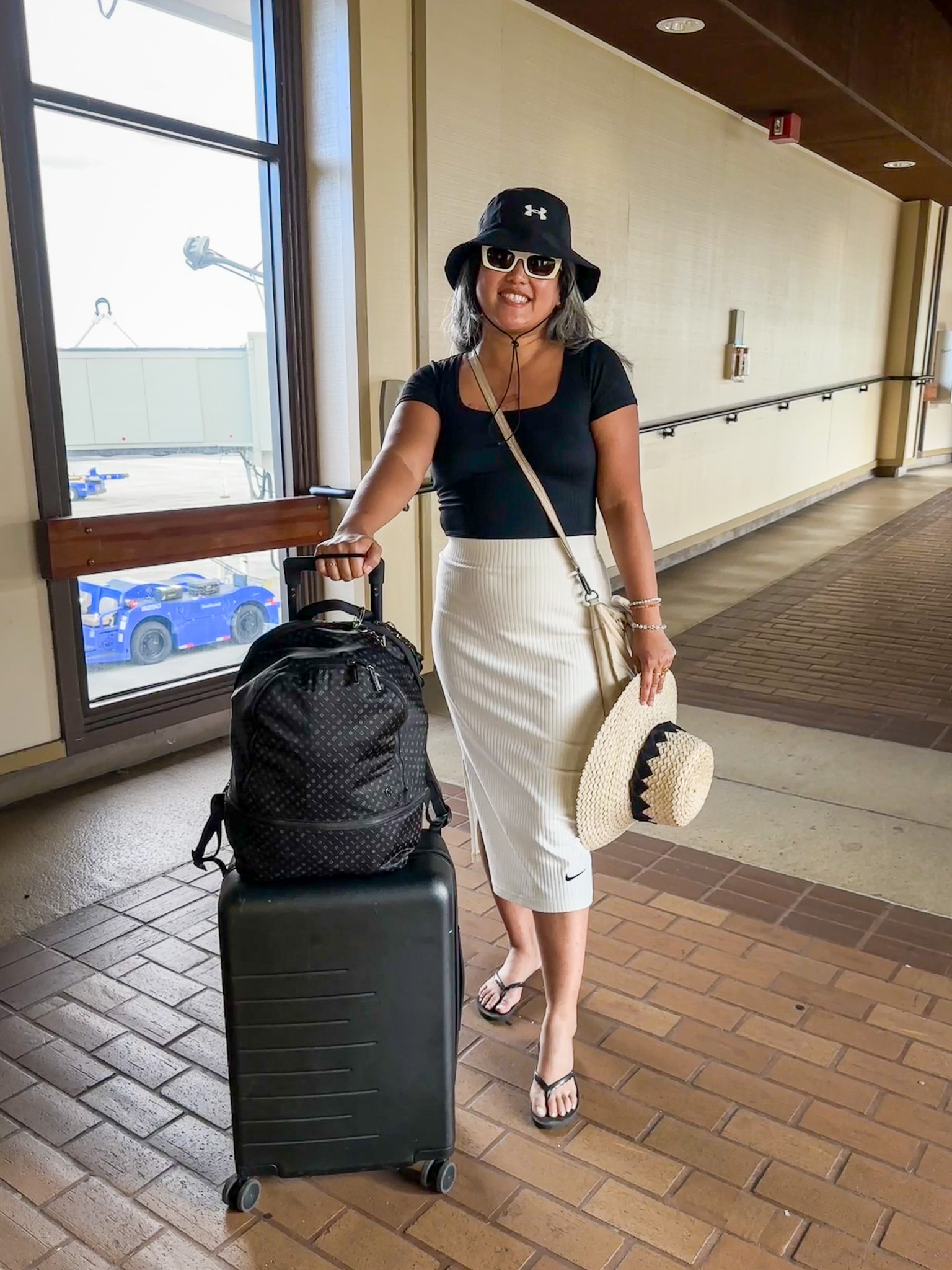 travel outfit hawaii nike skirt under armour hat oka b sandals quince luggage latico dalton Crossbody bag lululemon city adventurer backpack