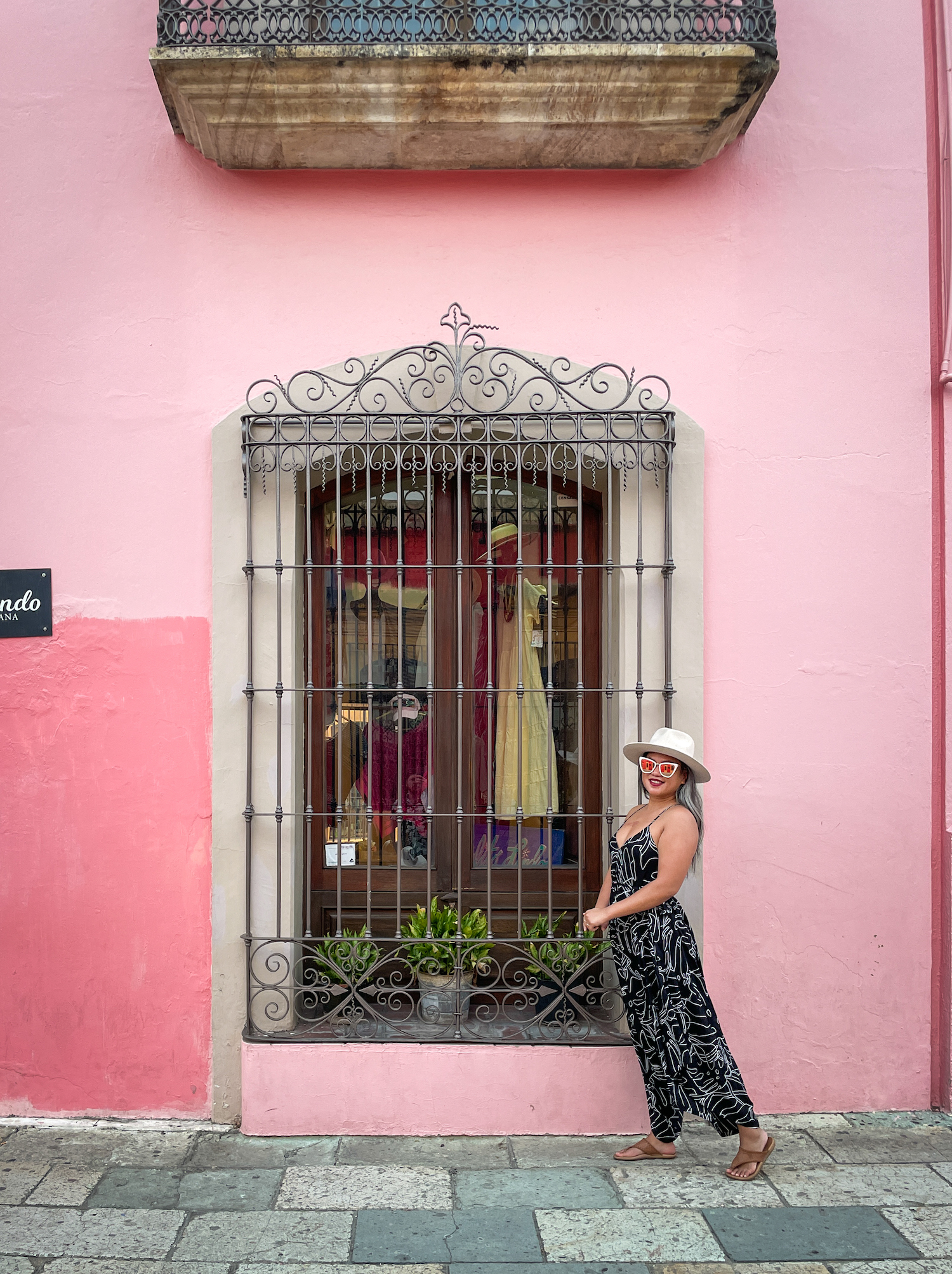 Pink wall in Oaxaca Mexico World Market Monstera Jumpsuit Gigi Pip Zephyr Hat