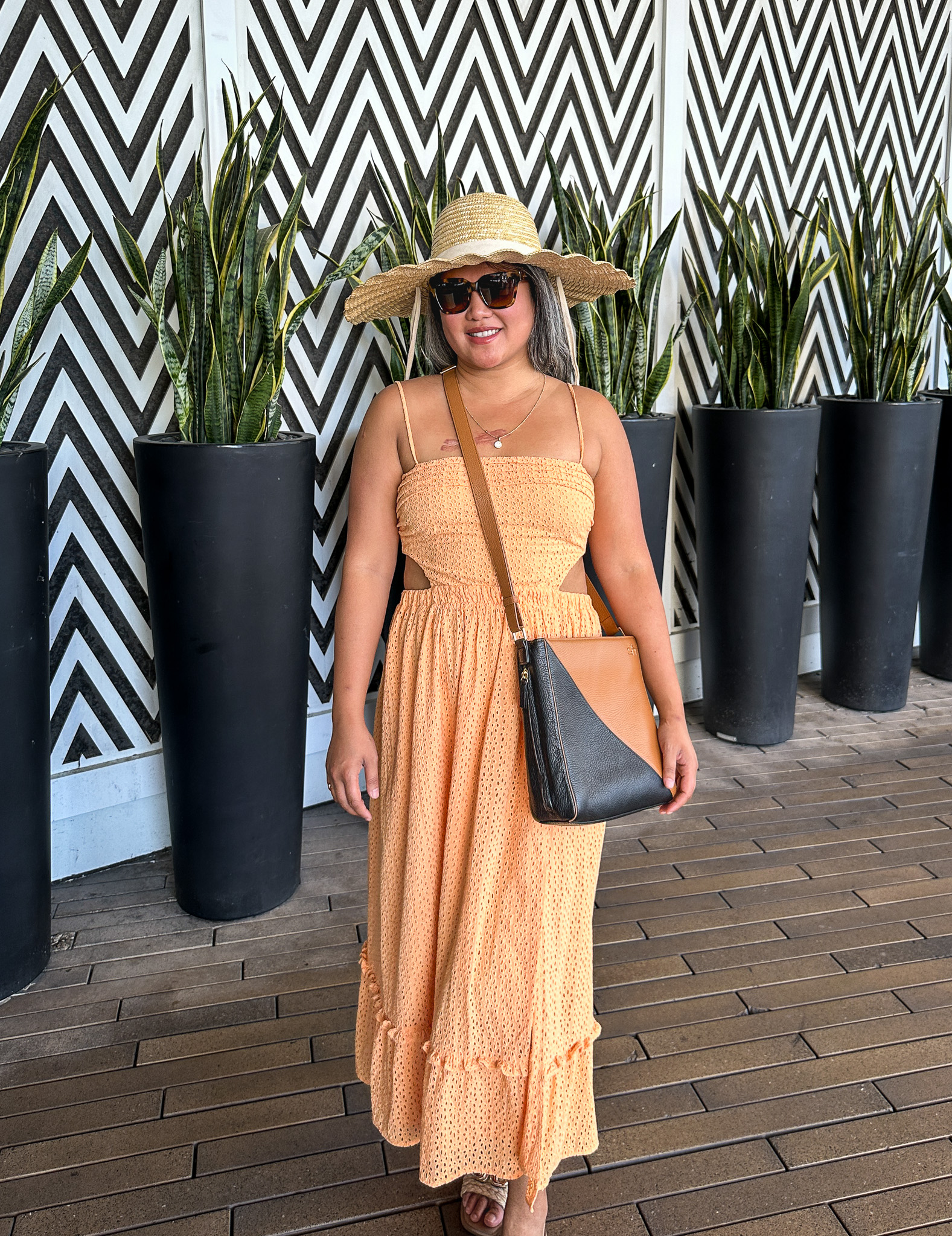 Swatzell and Heilig Seville Crossbody Bag Lack of Color hat Mohala Eyewear Sunglasses Camila Coelho Lacy Dress Orange