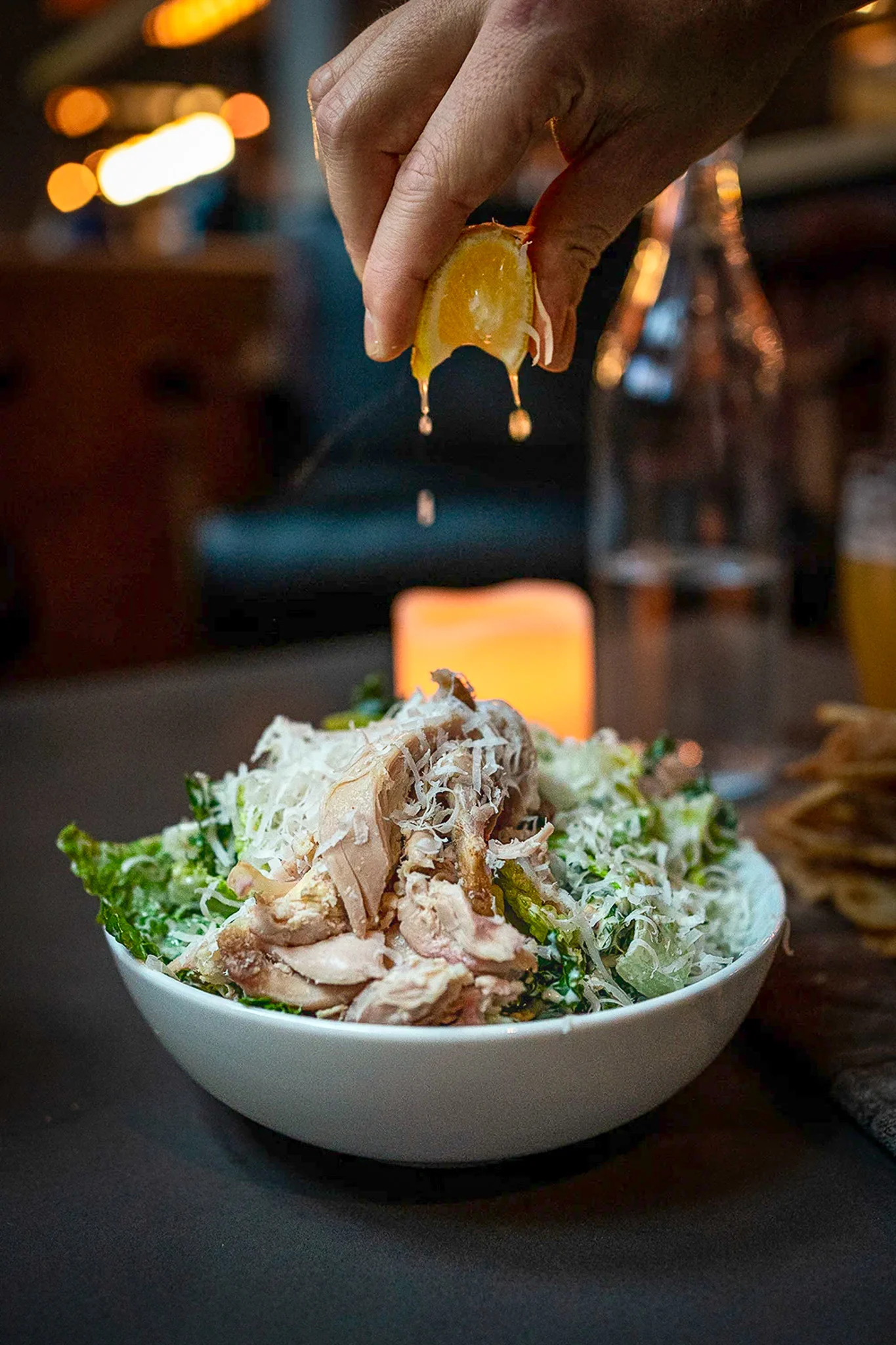 Happy-hour-caesar-salad-with-rotisserie-chicken-from-Victor-Tavern-in-downtown-Seattle