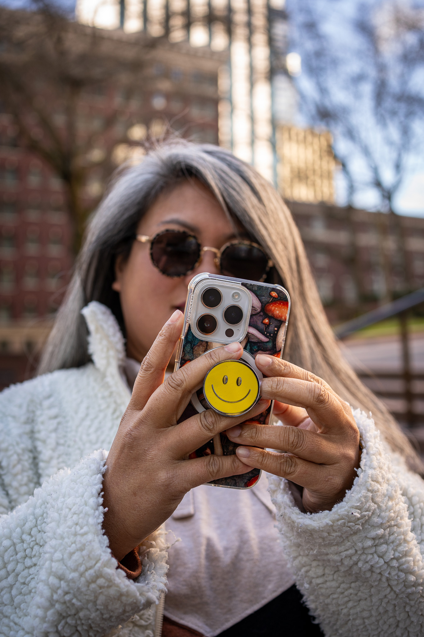 Popsockets mushroom phone case and smiley face grip schimiggy