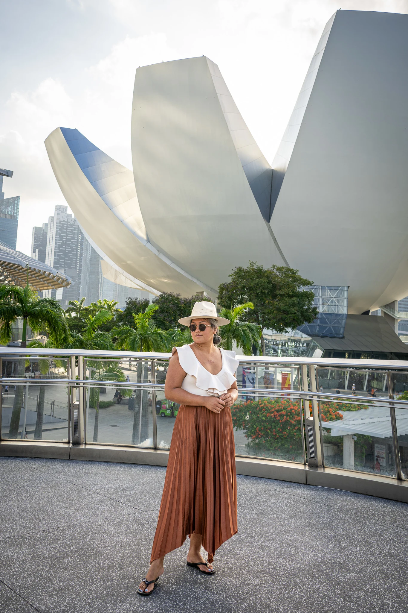 ArtScience Museum Singapore Ona by Yoon American Hat Makers Zesica pleated skirt Oka-b sandals