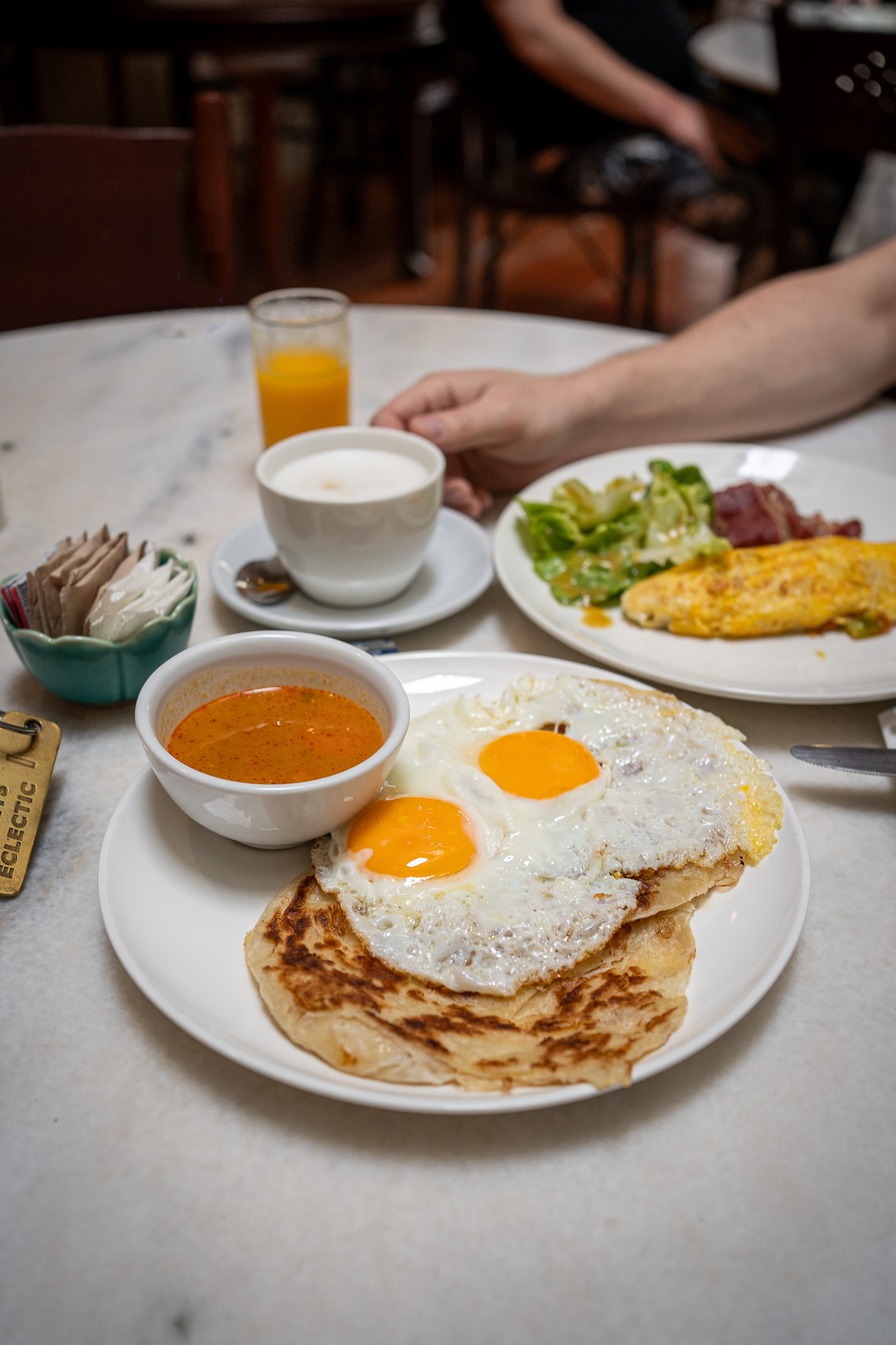 Roti Canai with fried egg breakfast at 23 Lovelane Boutique Hotel