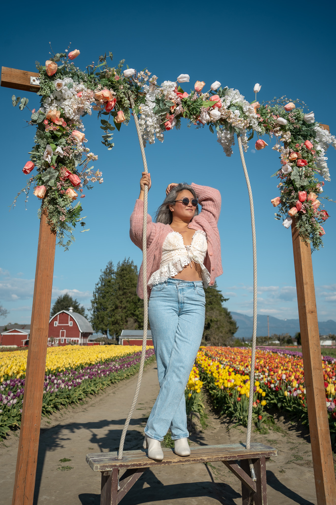 nbd revolve lace top sezane pink sweater abercrombie jeans tulip town flower swing