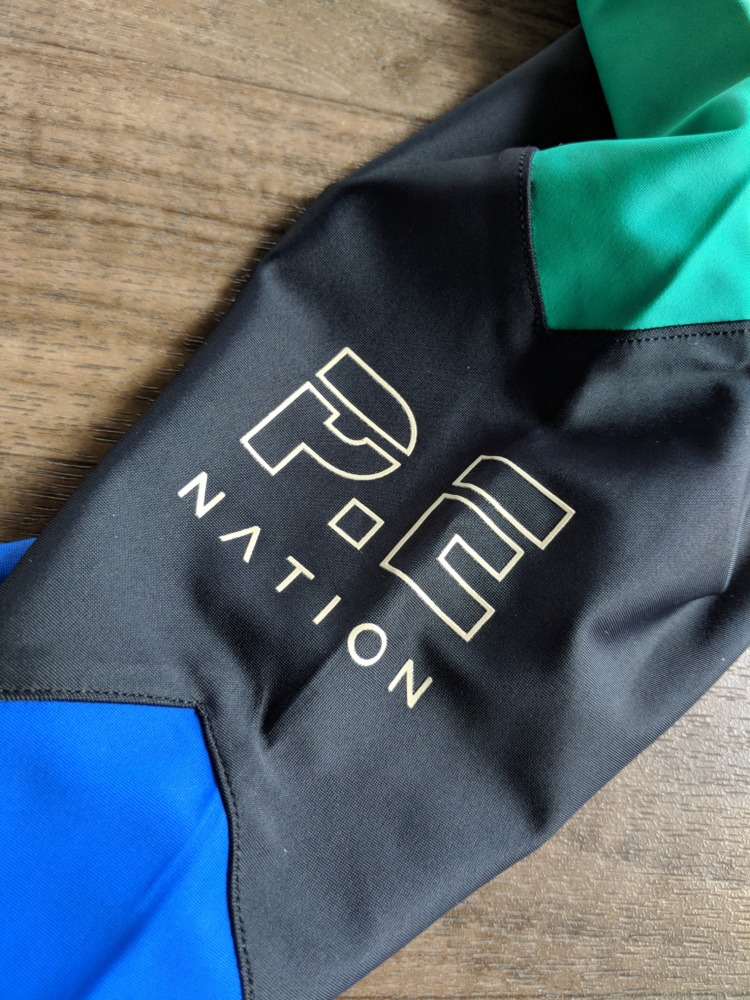 P.E Nation review Riseball Legging Logo