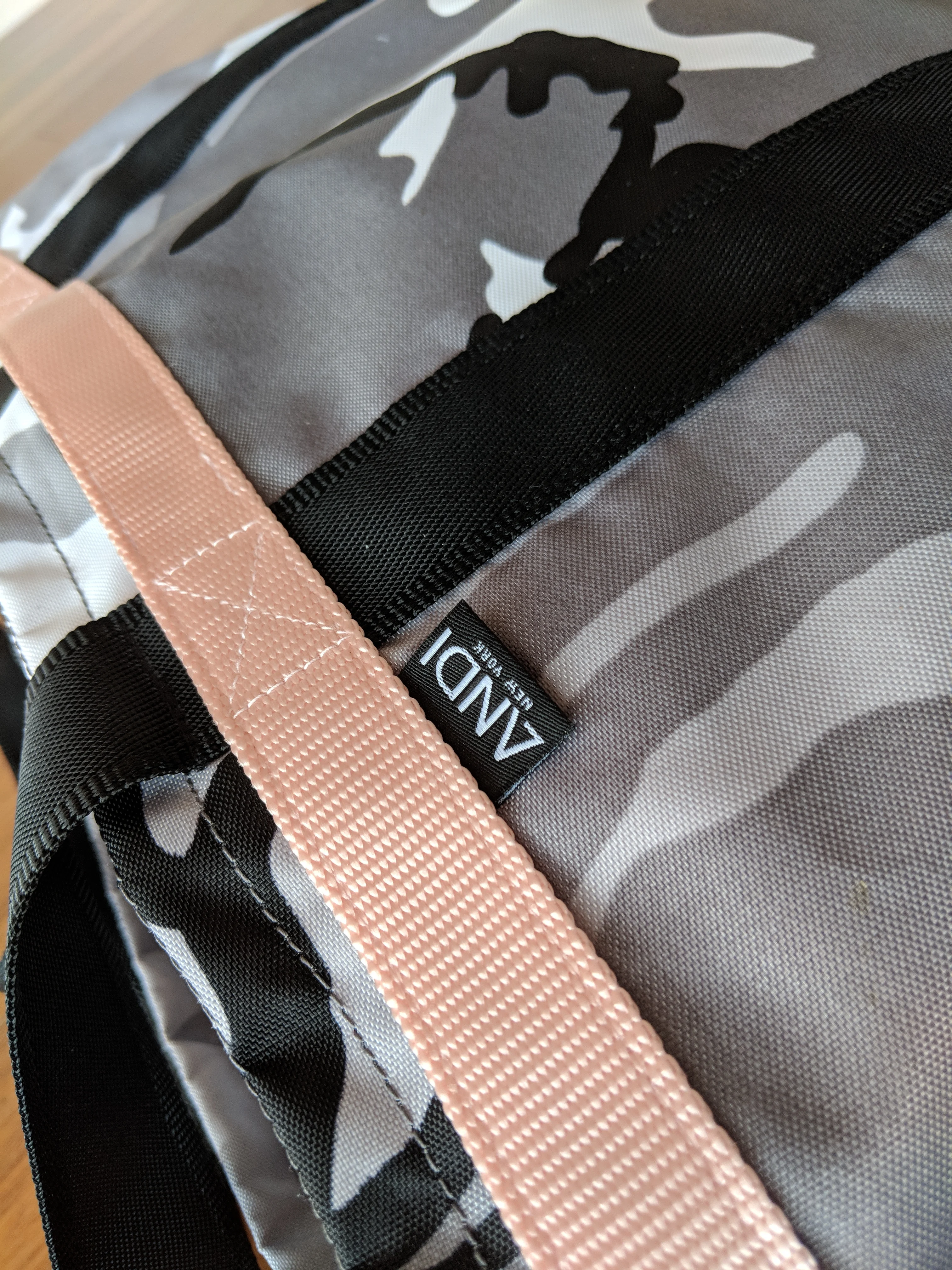 Andi Bag Review: Winter Camo and Quartz Pink logo detail