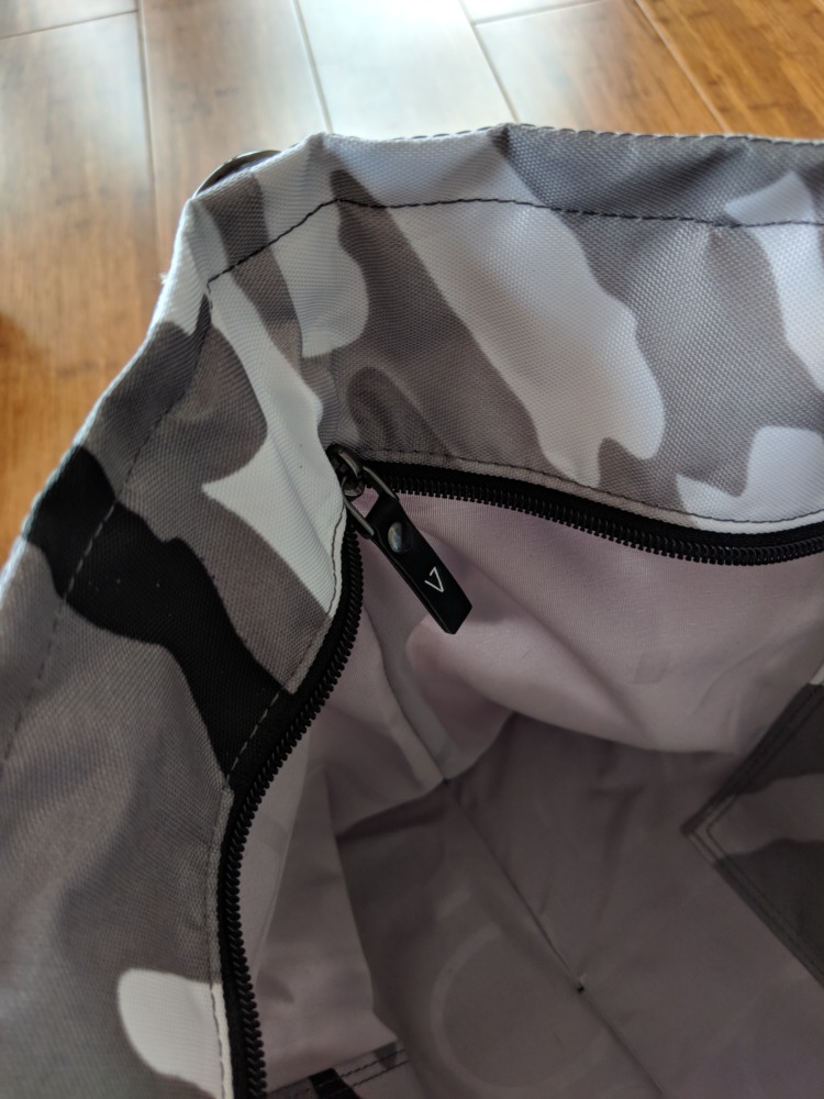 Andi Bag Review: Winter Camo and Quartz Pink zipper detail