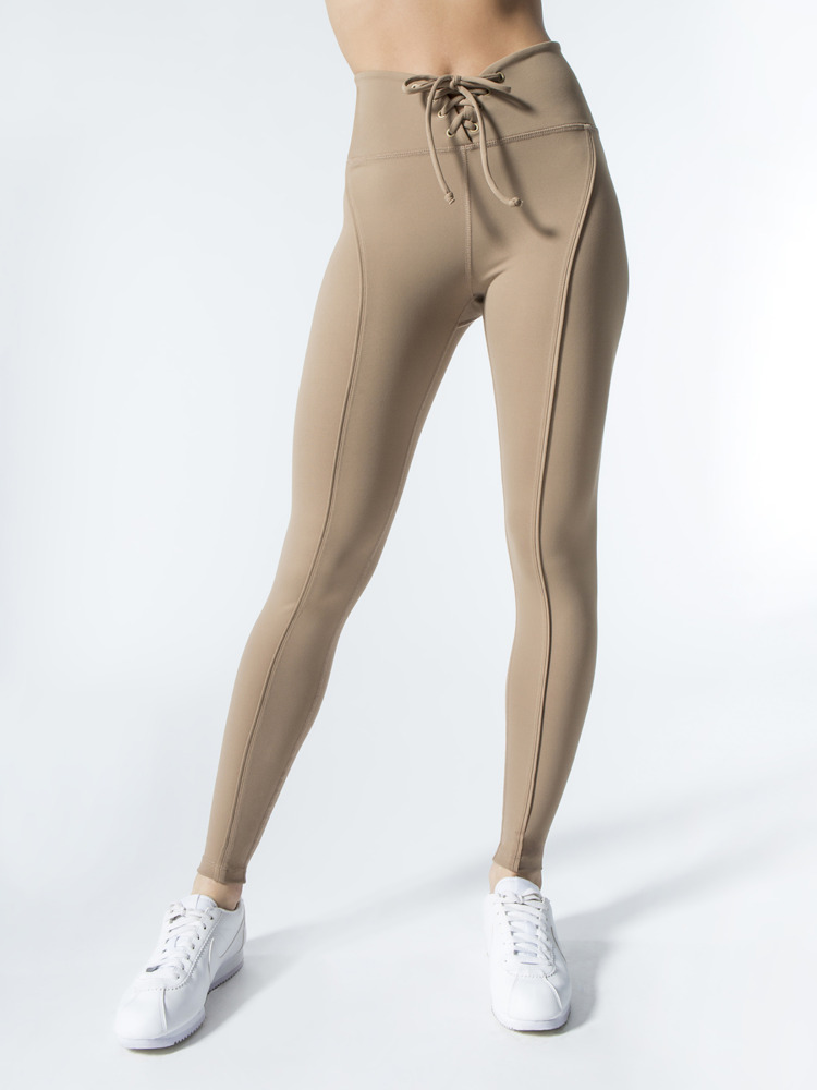 https://www.schimiggy.com/wp-content/uploads/2018/06/year-of-ours-football-legging-doe-nude-front.jpg