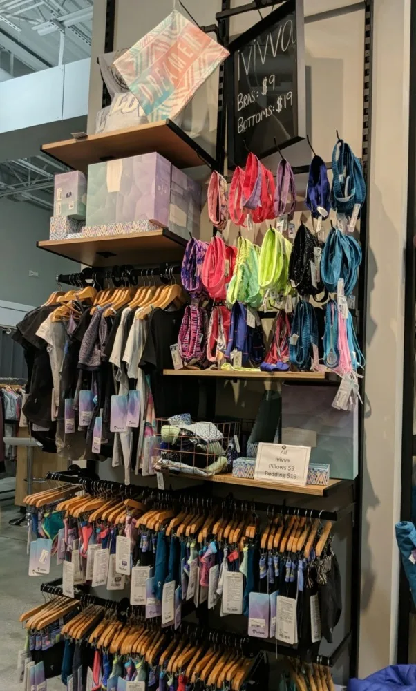 Ivivva wall filled with accessories and clothing for young girls. 