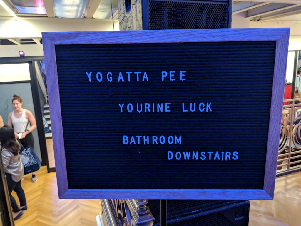 lululemon 20 year anniversary party funny bathroom sign