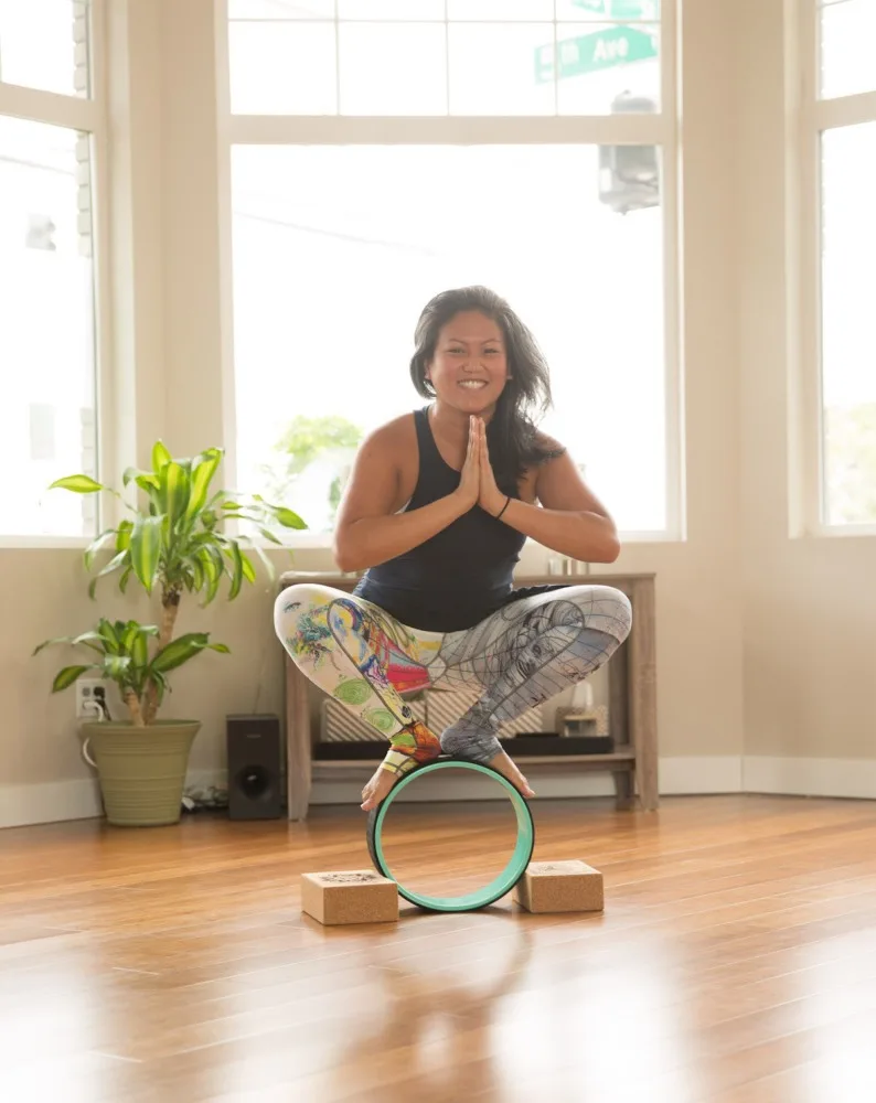Malasana or Squat with a Yoga Wheel + Sukha Blocks