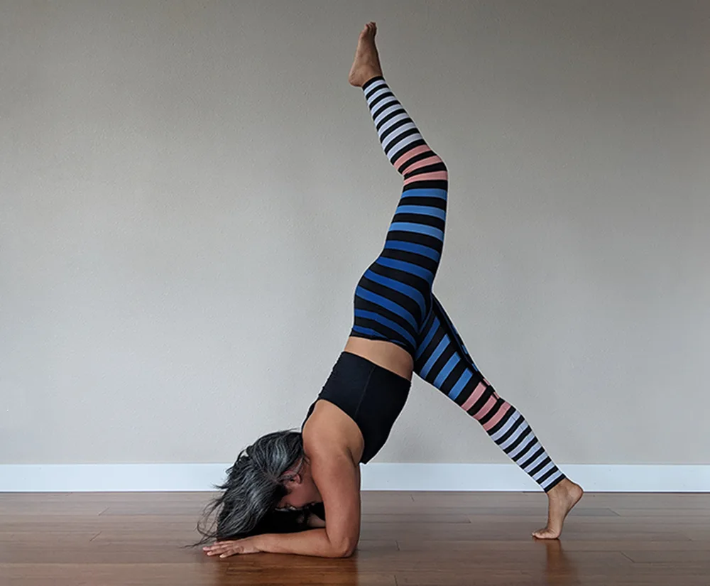 49 Forearm Balance or Feathered Peacock Pose (Pincha Mayurasana