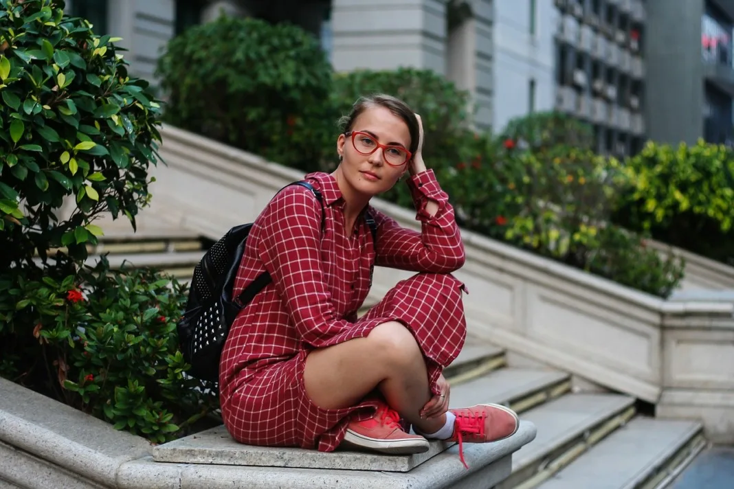 girl wearing backpack work outfit casual