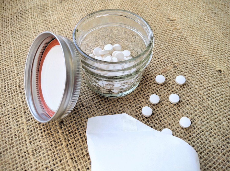 unpaste sustainable zero waste toothpaste tablets in small mason jar