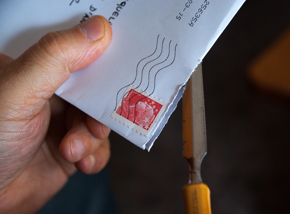 mail letter being opened