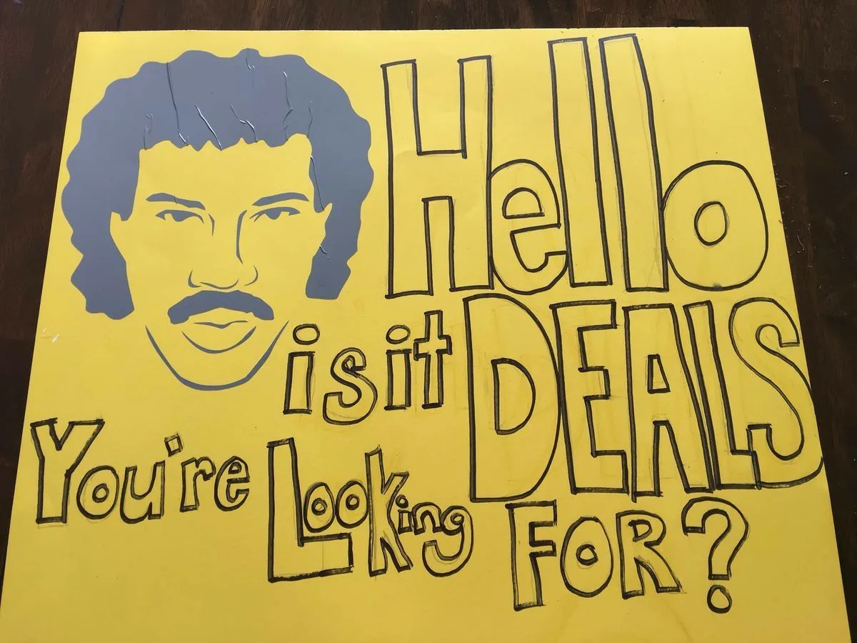 garage sale sign lionel richie hello