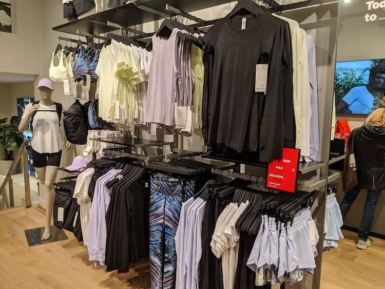 lululemon amsterdam store and product photos womens tops and bottoms wall
