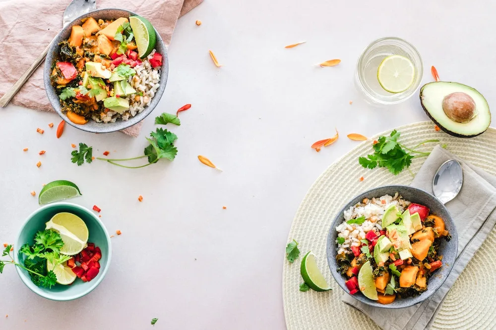 healthy meal bowls with avocado pumpkin and quinoa