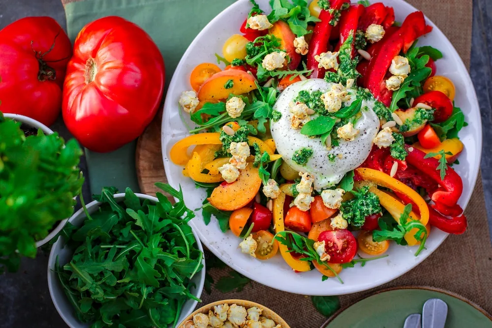 healthy meal colorful salad bowl with bell peppers and tomatoes