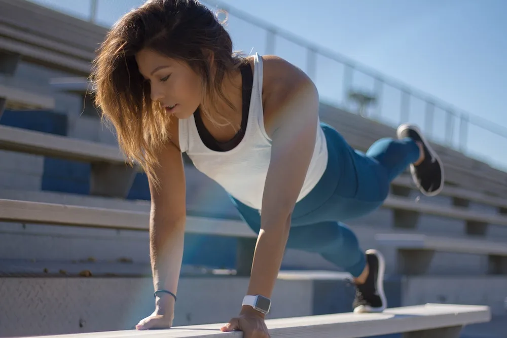 woman doin plank workout outfit mix and match tops bottoms