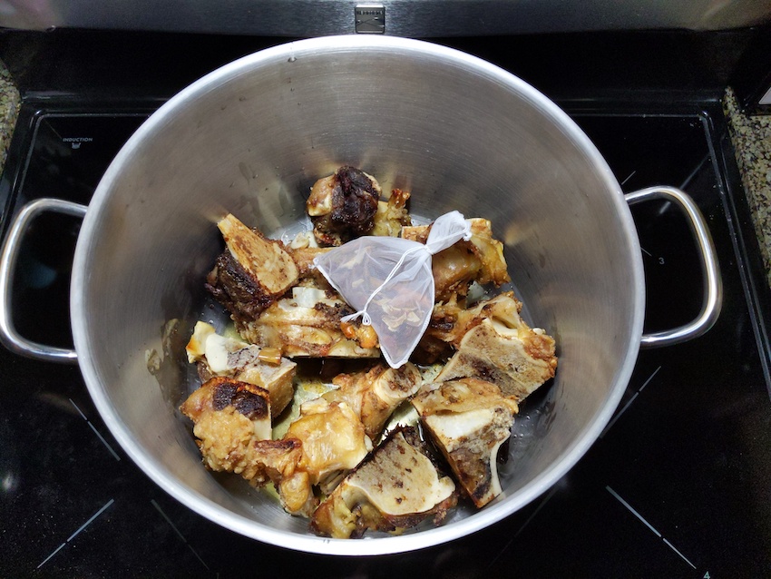 browned beef pho bones and seasoning satchel