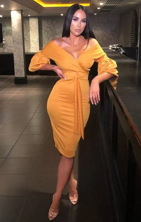 femme luxe angelica body con dress in mustard yellow