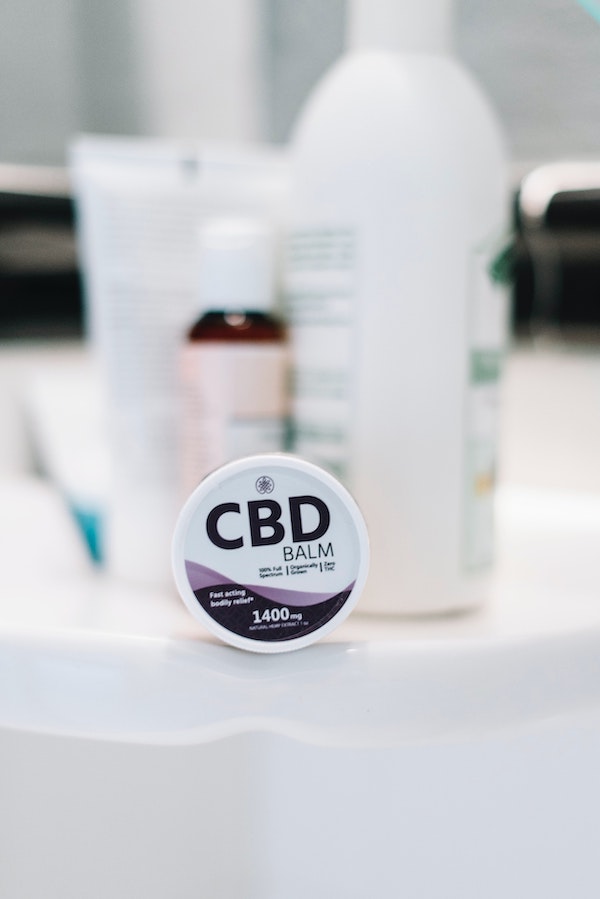 cbd balm on bathroom counter