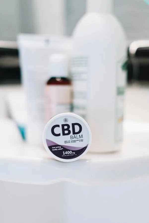 cbd balm on bathroom counter