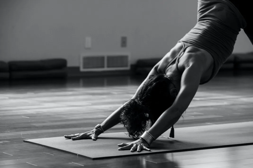 downward dog in black and white