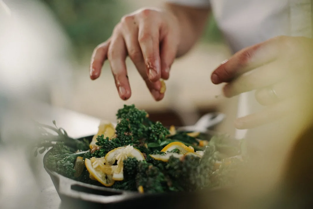 chef preparing a salad in the kitchen