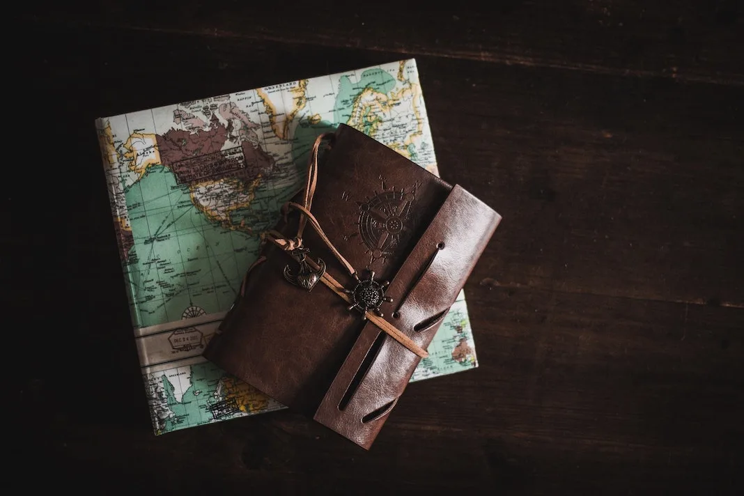 travel notebook and map