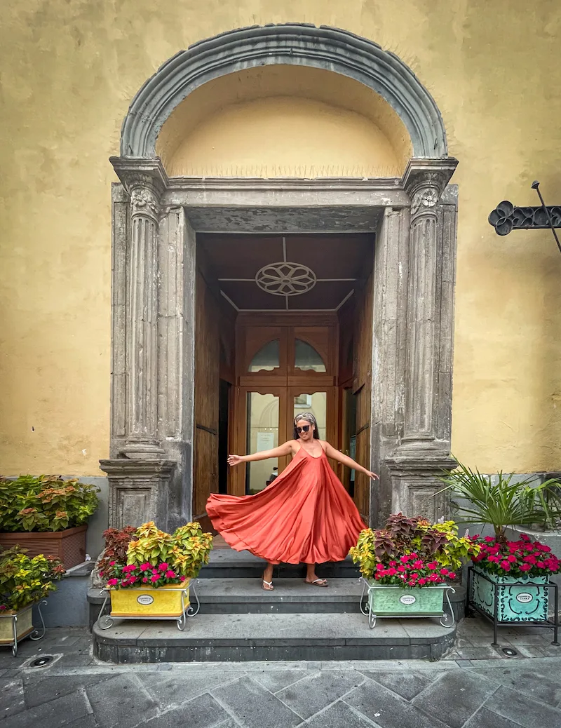 silk and salt go with the flow dress in positano italy doorway