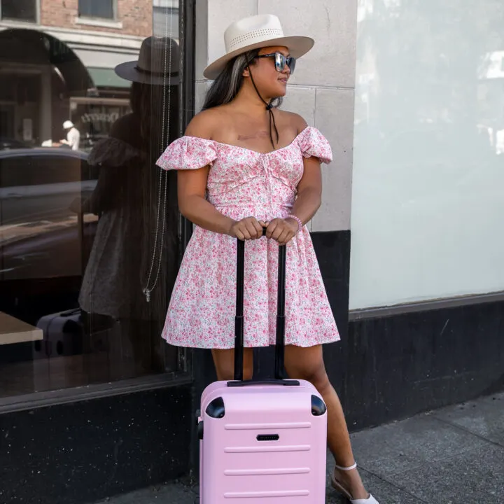 Solgaard Carry On Plus Luggage LAIT Gia Dress Viscata Montroig sandals American Hat Makers Barcelona Hat
