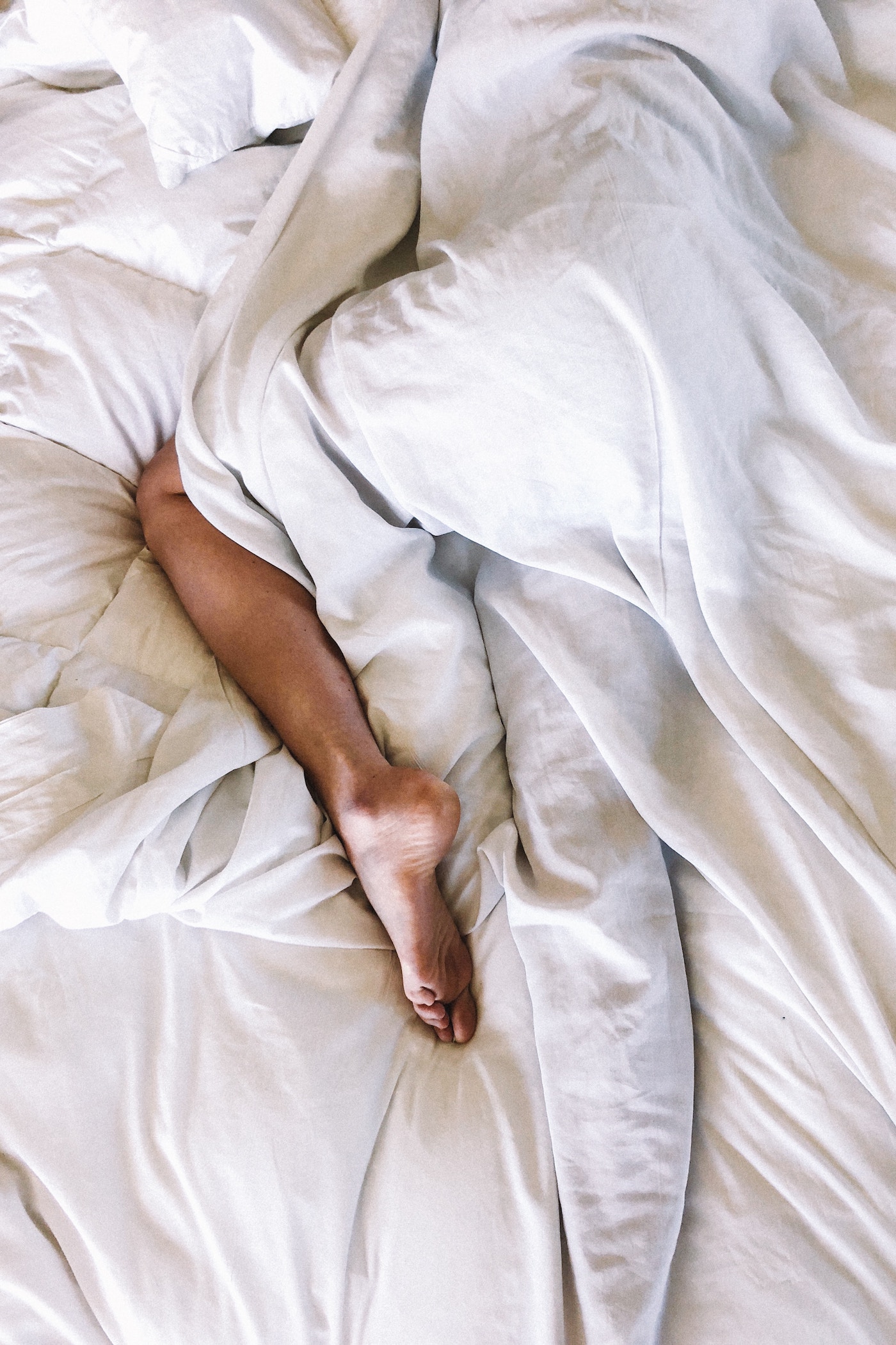 How to Sleep With a Partner Who Sweats Too Much